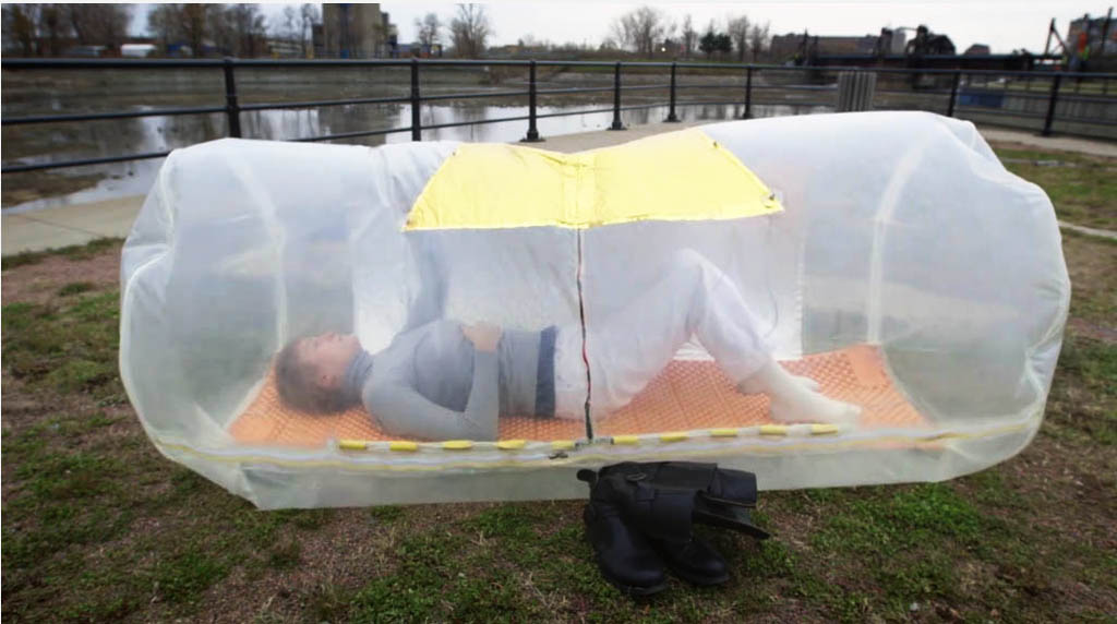 Ana Rewakowicz's Sleeping Bag Dress expands to become a kind of cocoon, in the documentary film Microtopia.