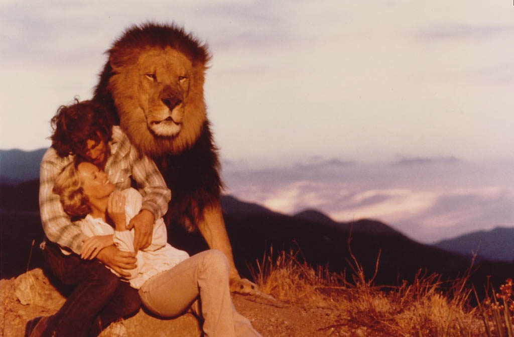 Family portrait: Husband, wife, lion, in a scene from the 1981 ilm Roar.s