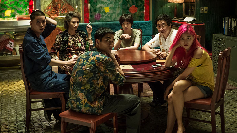 Mom (Kim Hye-soo, with cigarette) and Il-young (Kim Go-Eun, centre in khaki T-shirt) in Coin Locker Girl.