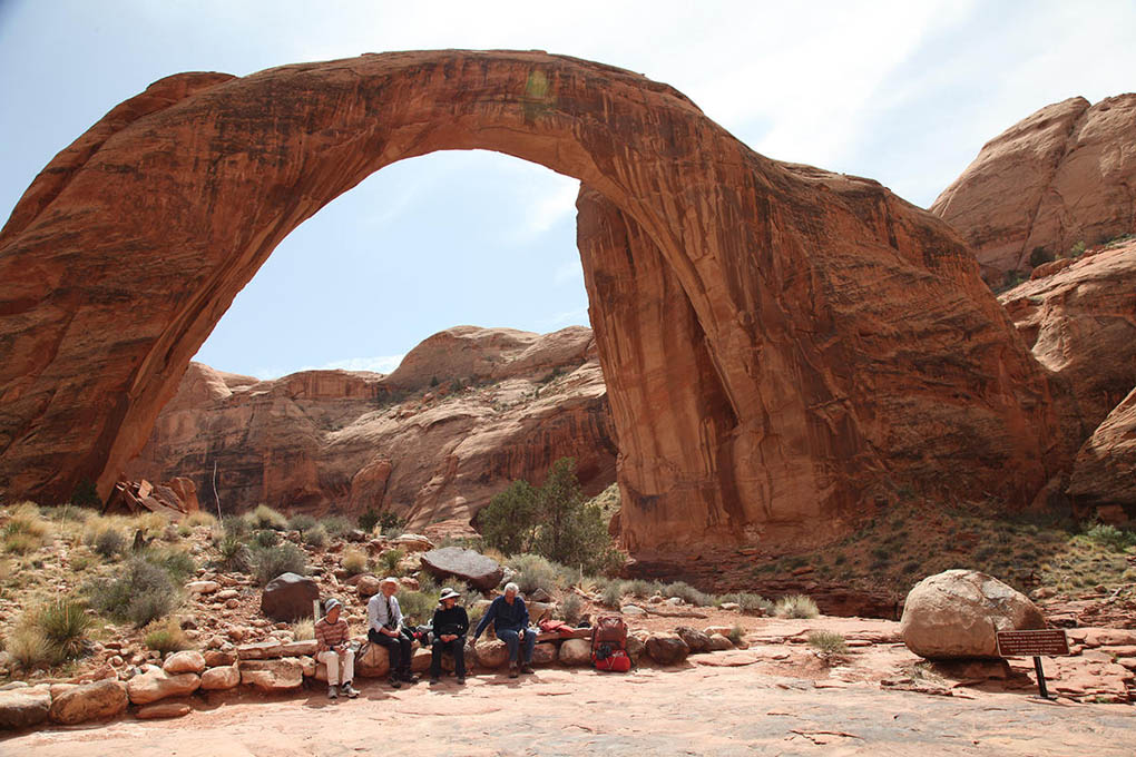 Director Alison Rose, second from right, and her astronomer friends take a break at the Rainbow Bridge National Monument in Utah.